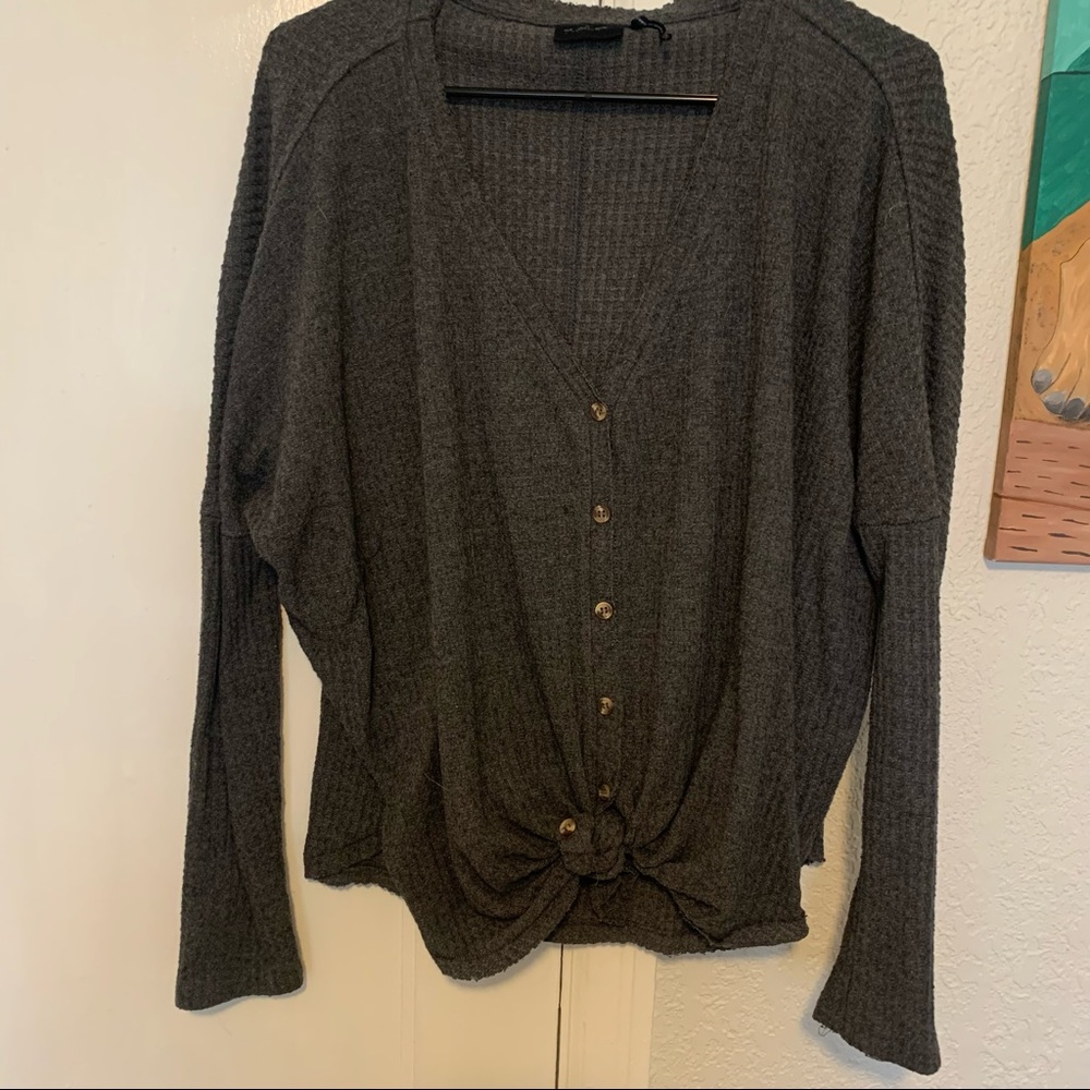 Urban Outfitters button up tied waffle shirt out from under Jo-Jo